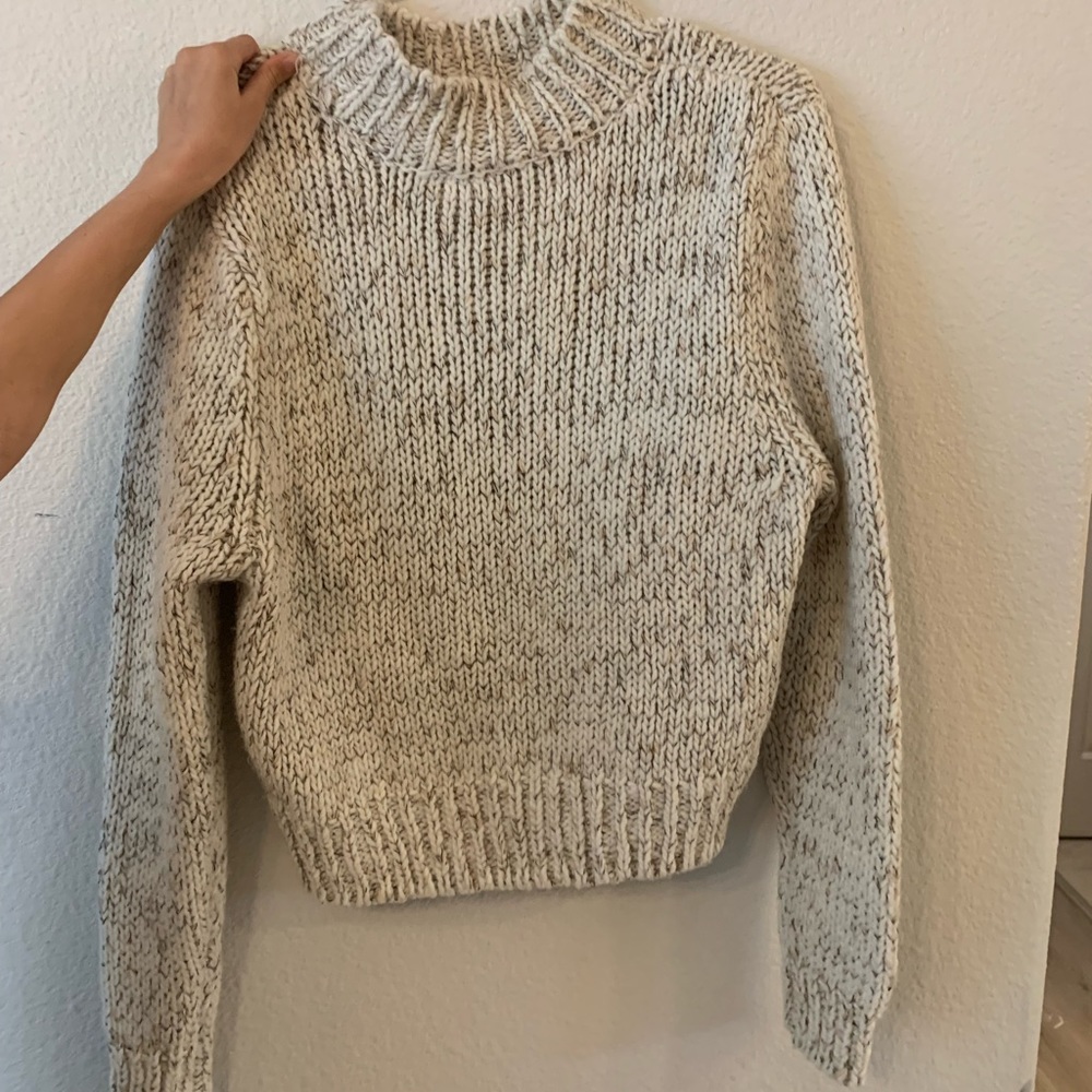 Beige and white sweater